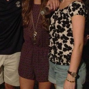 Purple patterned open back romper with pockets